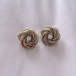 Large stud earrings on gold with diamond